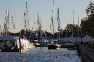 A sail boat departing the boat show